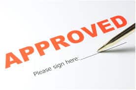 Pen above the signature line under the word Approved